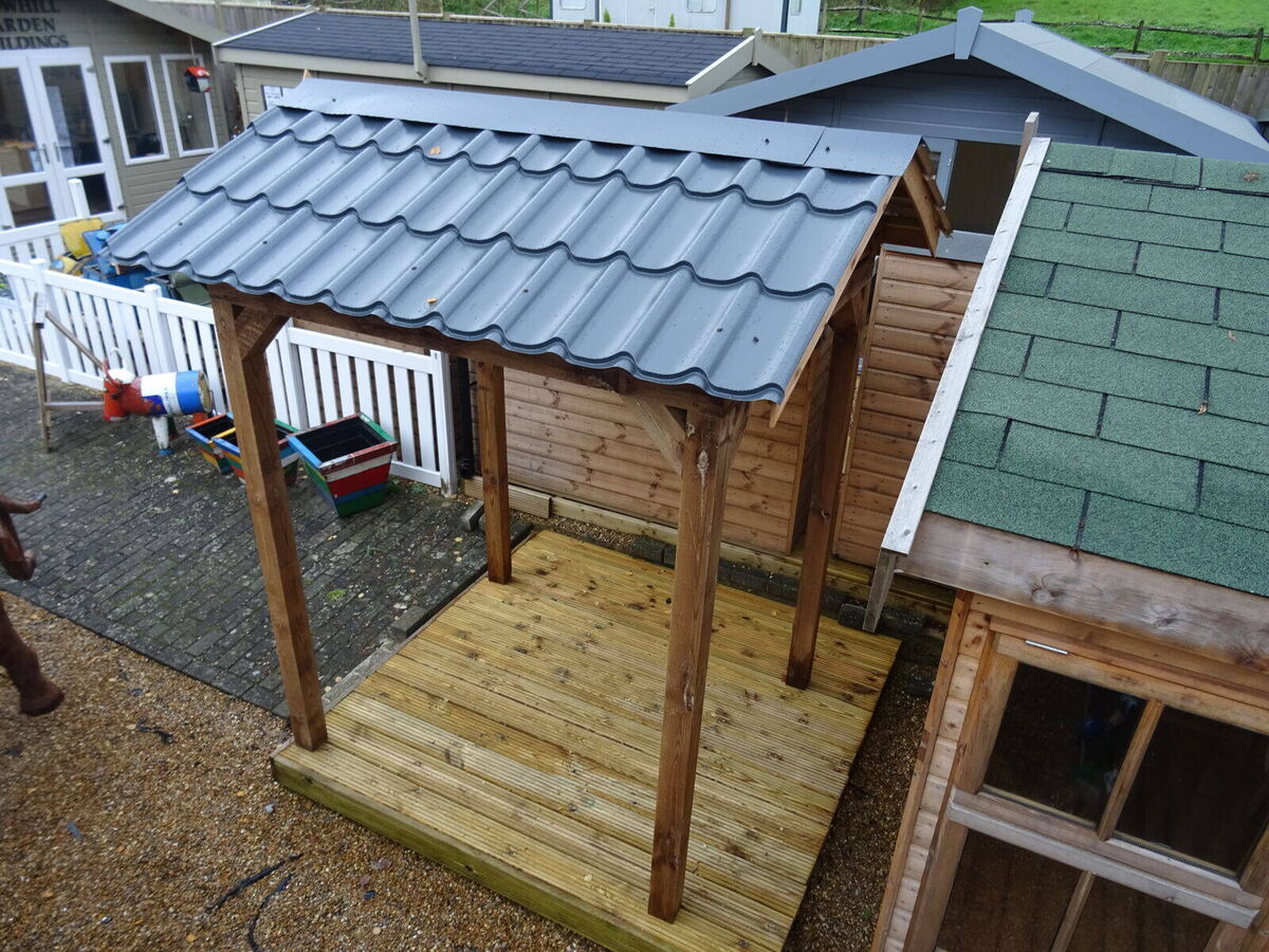 Large bespoke timber garden structure built by Cordreys in West Sussex