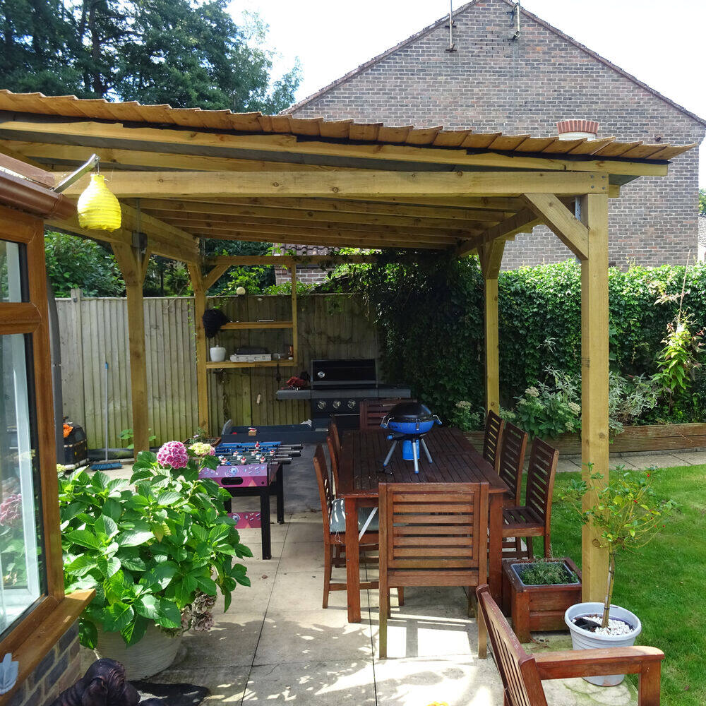 Timber pergola built by Cordreys in a Surrey garden
